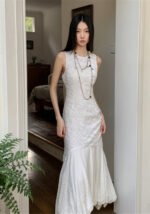Sleeveless White Embossed Midi Dress Flowy Ruffled Hem