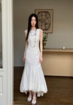 Sleeveless White Embossed Midi Dress Flowy Ruffled Hem