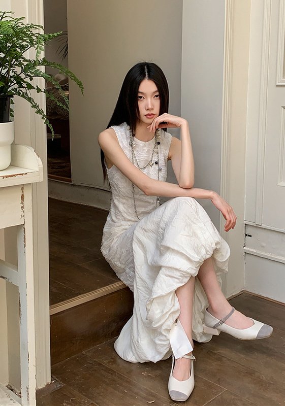 Sleeveless White Embossed Midi Dress Flowy Ruffled Hem