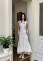 Sleeveless White Embossed Midi Dress Flowy Ruffled Hem