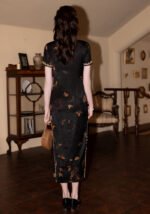Elegant Black Qipao with Golden Floral Patterns