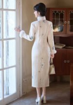 Elegant Ivory Cheongsam with Fur Trim and Floral Embroidery