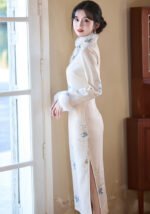 Elegant Ivory Cheongsam with Fur Trim and Floral Embroidery